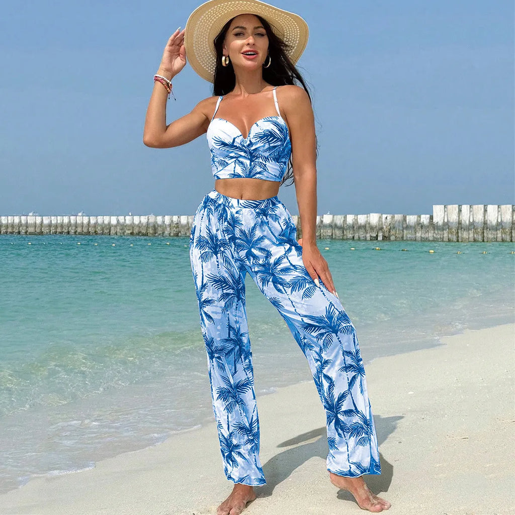Women's three-piece bikini set in printed polyester and spandex with top and pants, available in black blue emerald green