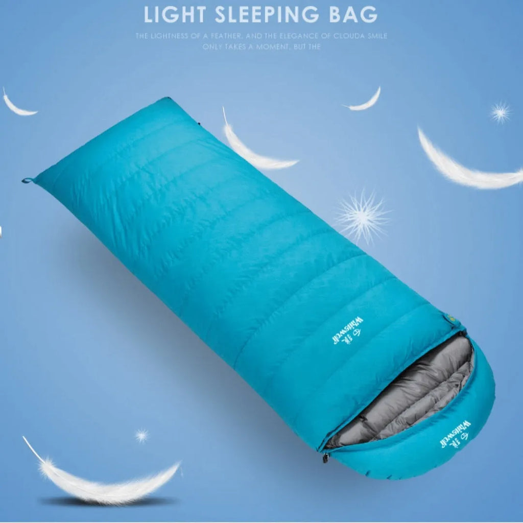 Black outdoor sleeping bag with envelope design, filled with goose down and made from tear-resistant nylon.