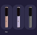 Wireless anion straight comb in rose gold colour for portable hair styling