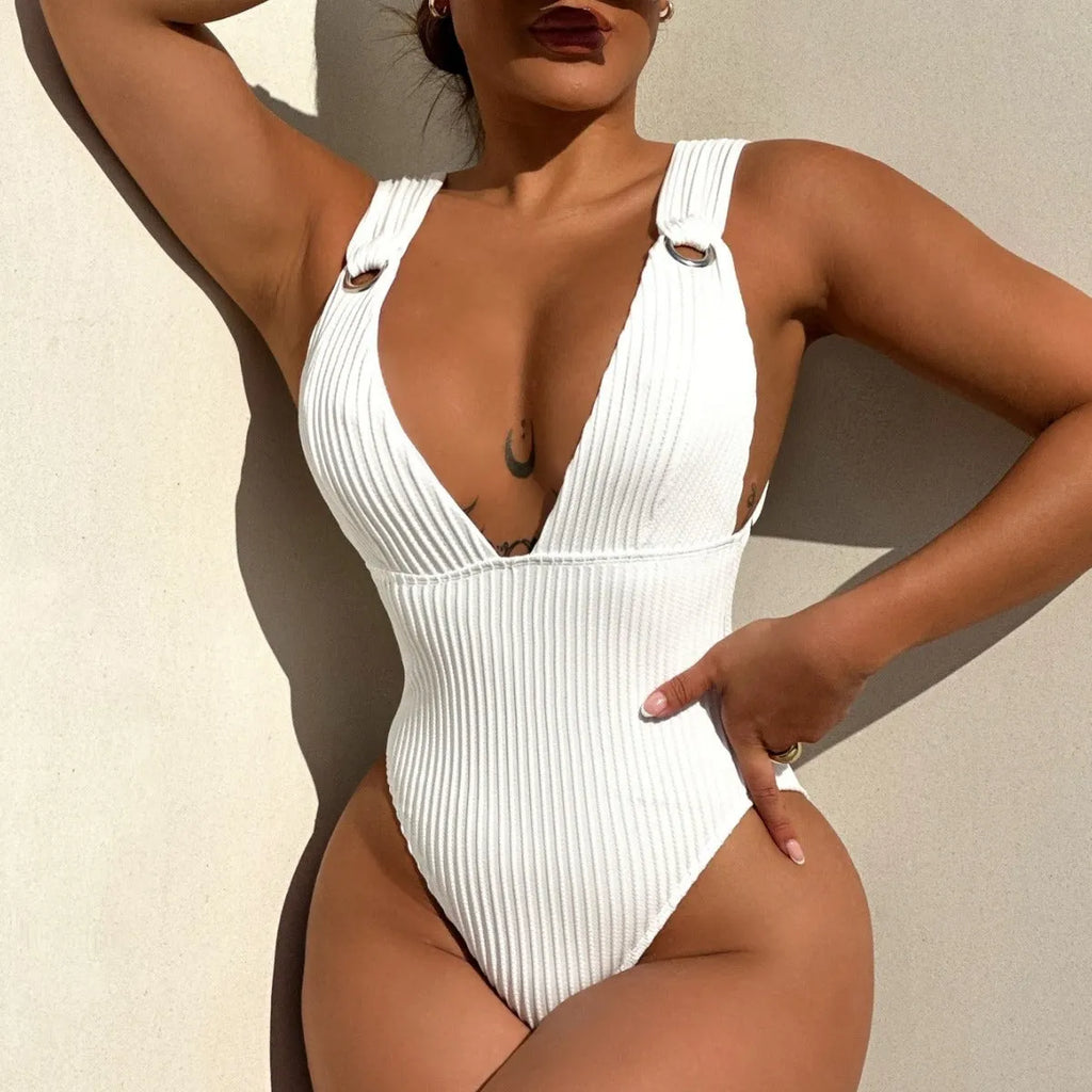 Women's solid colour one-piece swimsuit in black, white, green, or orange.
