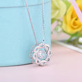 Fashion silver pendant set in rose gold white gold and silver colours on display