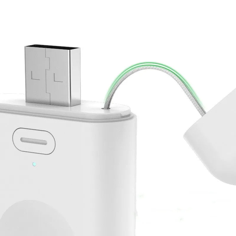White compact wireless charger power bank for Apple Watch with magnetic pad and Micro USB input