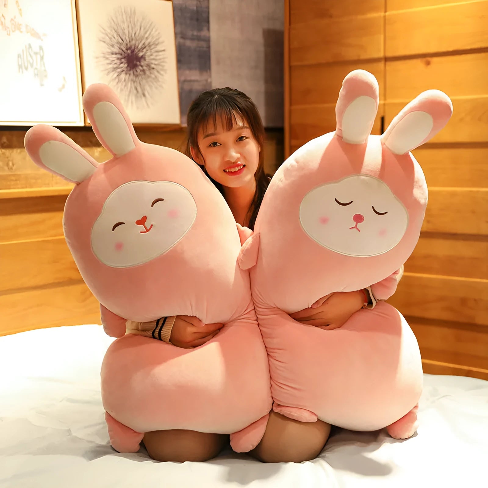 Cherry blossom pink plush rabbit doll with a soft fabric body, shown in 55cm, 75cm and 100cm sizes.
