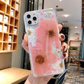 Flexible pink and yellow floral print TPU back cover case for iPhone.