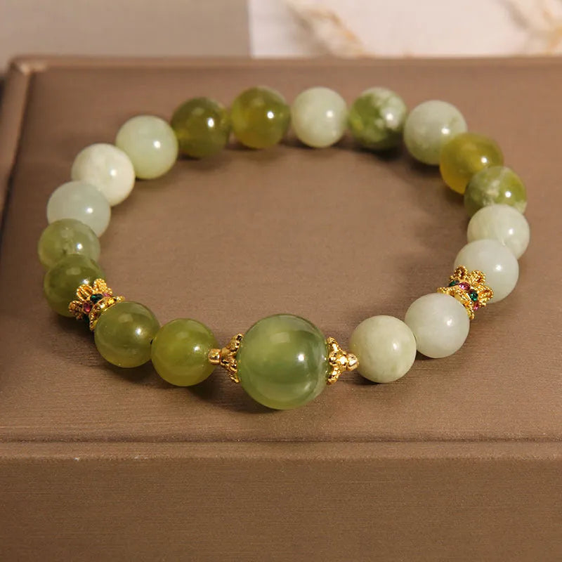 Women's Xiuyan jade bracelet in post-rain green colour with original design