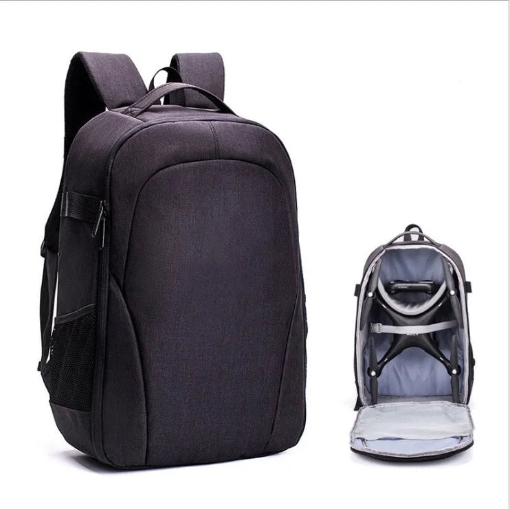 Black waterproof drone backpack with internal camera and laptop organisers showing multiple zipper compartments