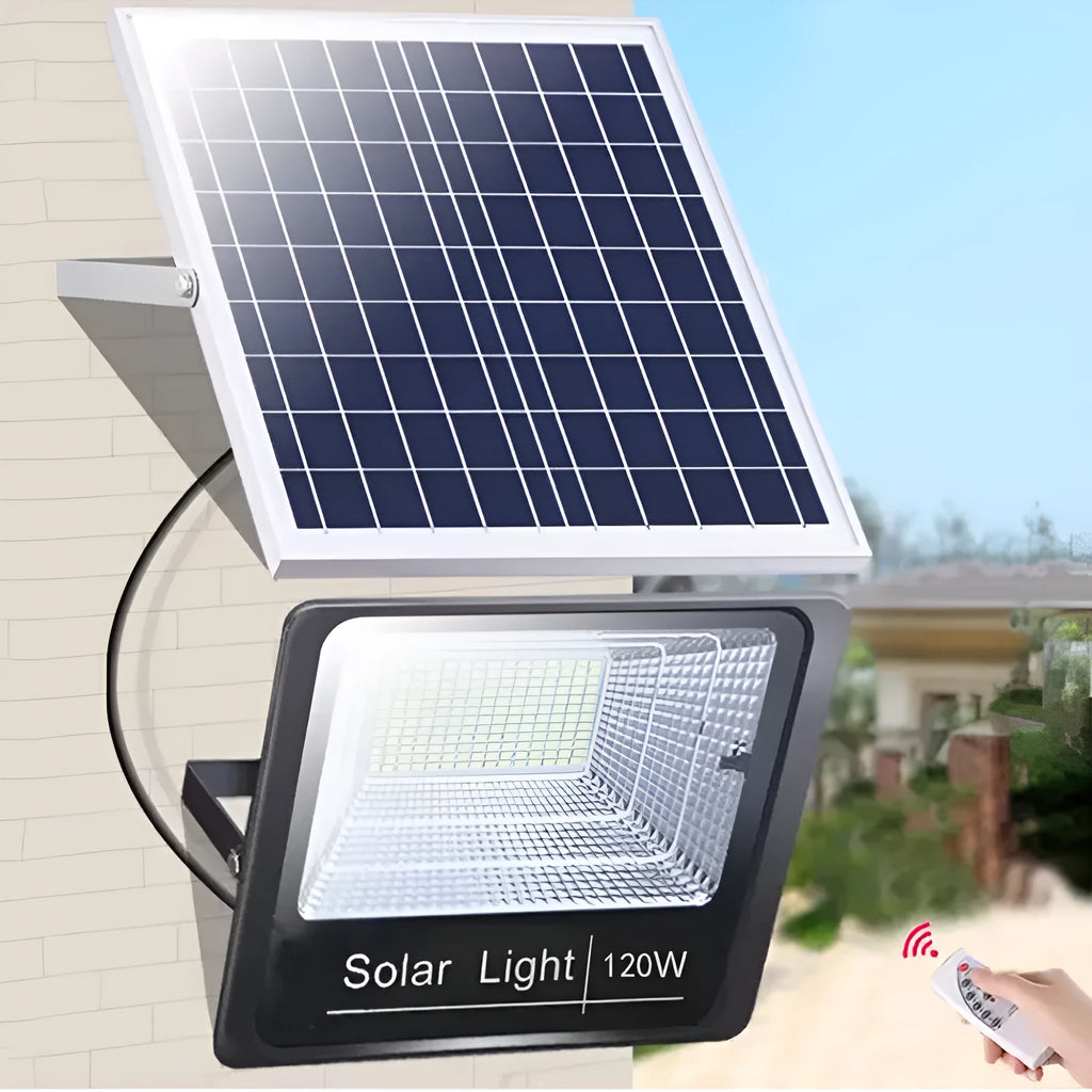 Black Cornucopia solar-powered LED flood light mounted on an outdoor wall with remote control.