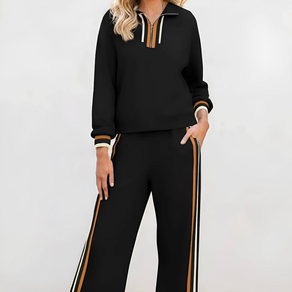 Black striped patchwork quarter zip pullover and loose trousers set on a model