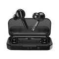 Black and white true wireless earbuds with charging case on a table, showing compact design.