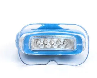 LED teeth whitening kit with wide edge tray and buckle denture system, available in blue, white, or red