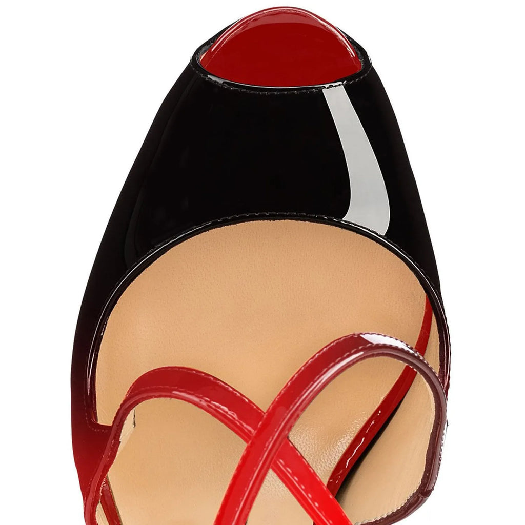 Women's black and red peep toe high heel shoes with a cross strap and super high heel.