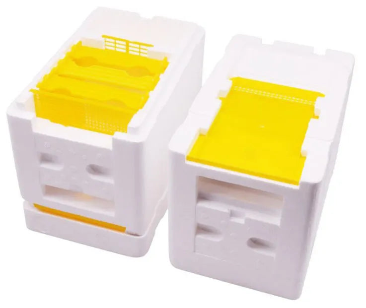 Three white EPS foam bee delivery boxes with hinged lids for queen bee mating and transport.