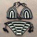 Hand crochet bikini set with cotton wrap top and woven texture on a woman by the beach