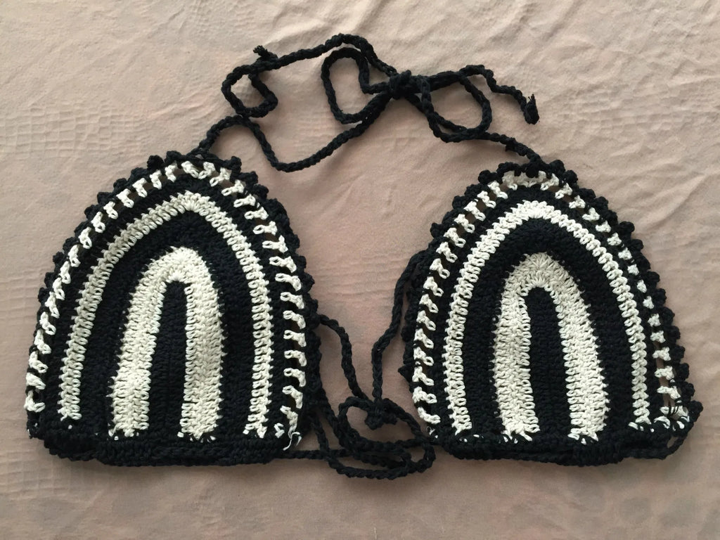 Hand crochet bikini set with cotton wrap top and woven texture on a woman by the beach