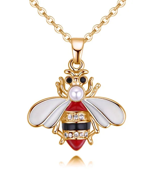 Cartoon bee drop pendant necklace with oil studded alloy finish on cross chain, yellow colour option, on white background