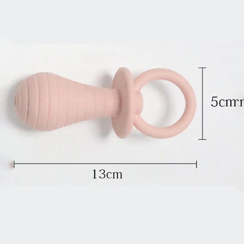 Four coloured pet pacifier rubber toys with squeakers for puppies and kittens