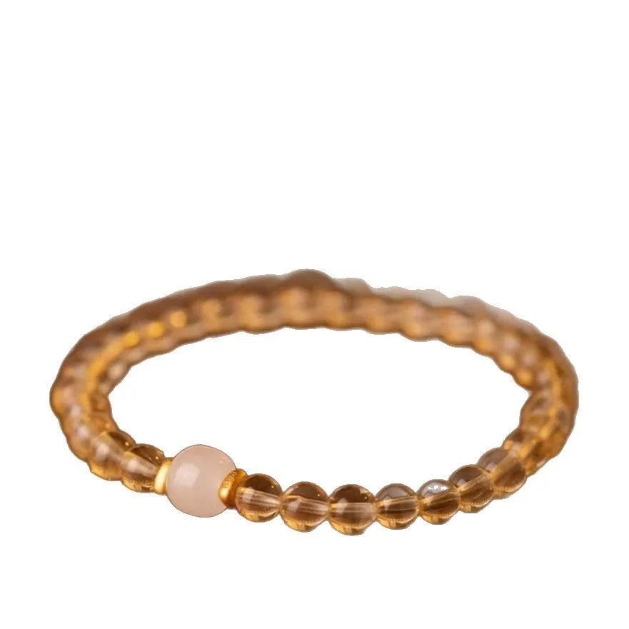 Brazilian rutilated quartz bracelet with gold rutile needle inclusions in 6mm or 8mm bead sizes