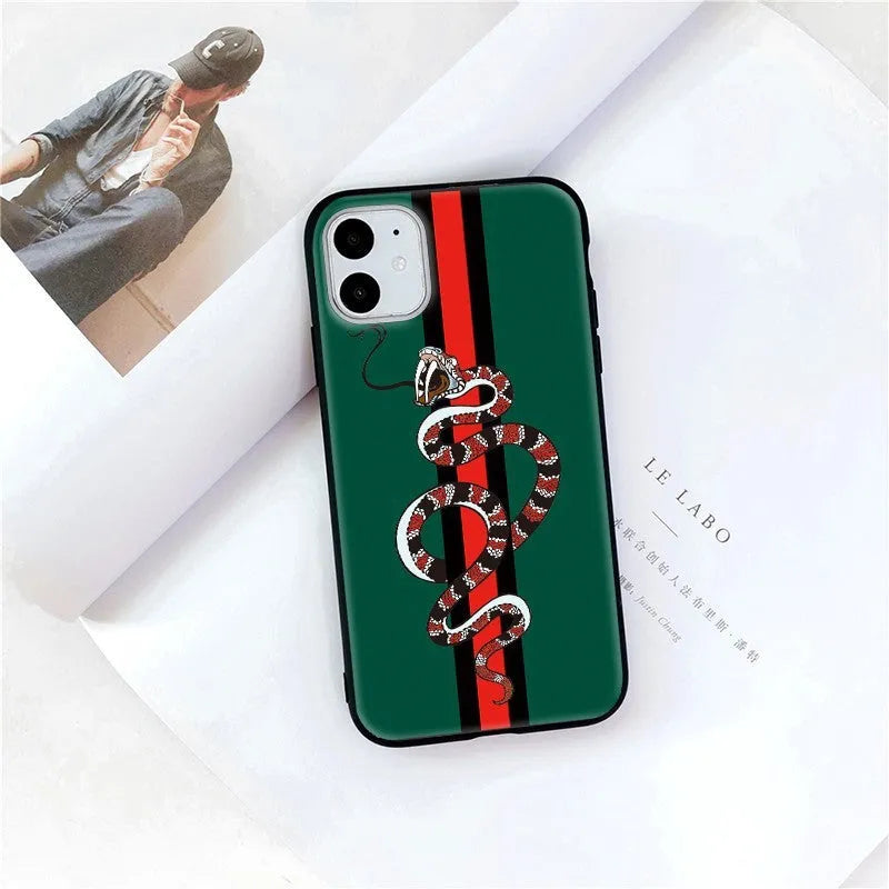 Black frosted iPhone case with cartoon snake design on back, slim TPU construction