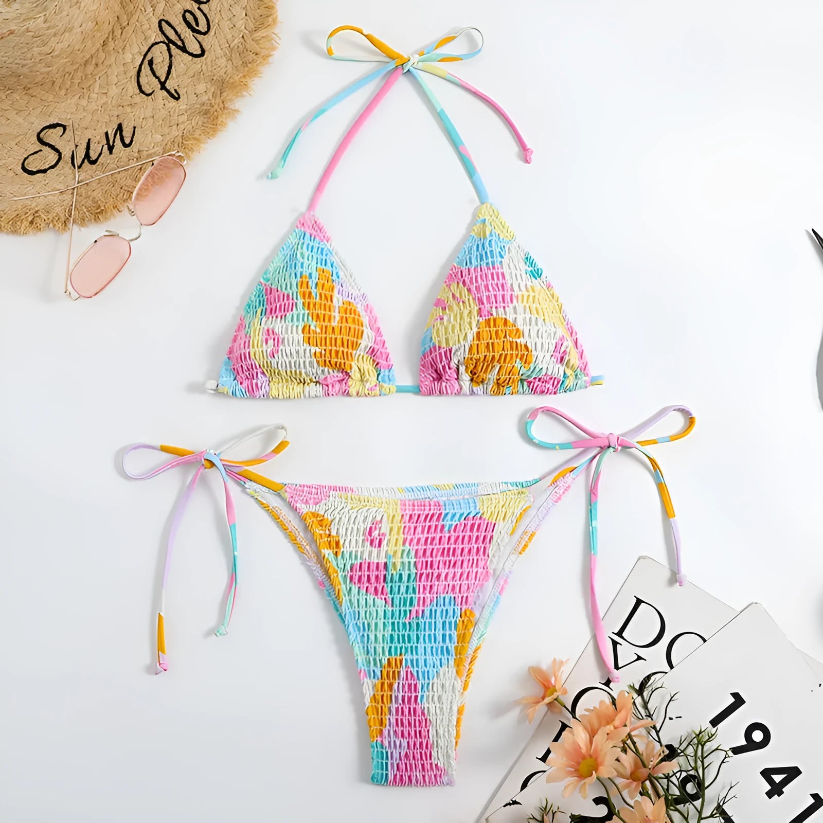 Women's triangle bag bikini swimsuit with printed floral gradient pattern and smocking detail
