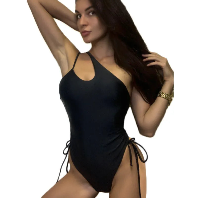 Black women's sleeveless dress with sloping shoulders and lacing detail