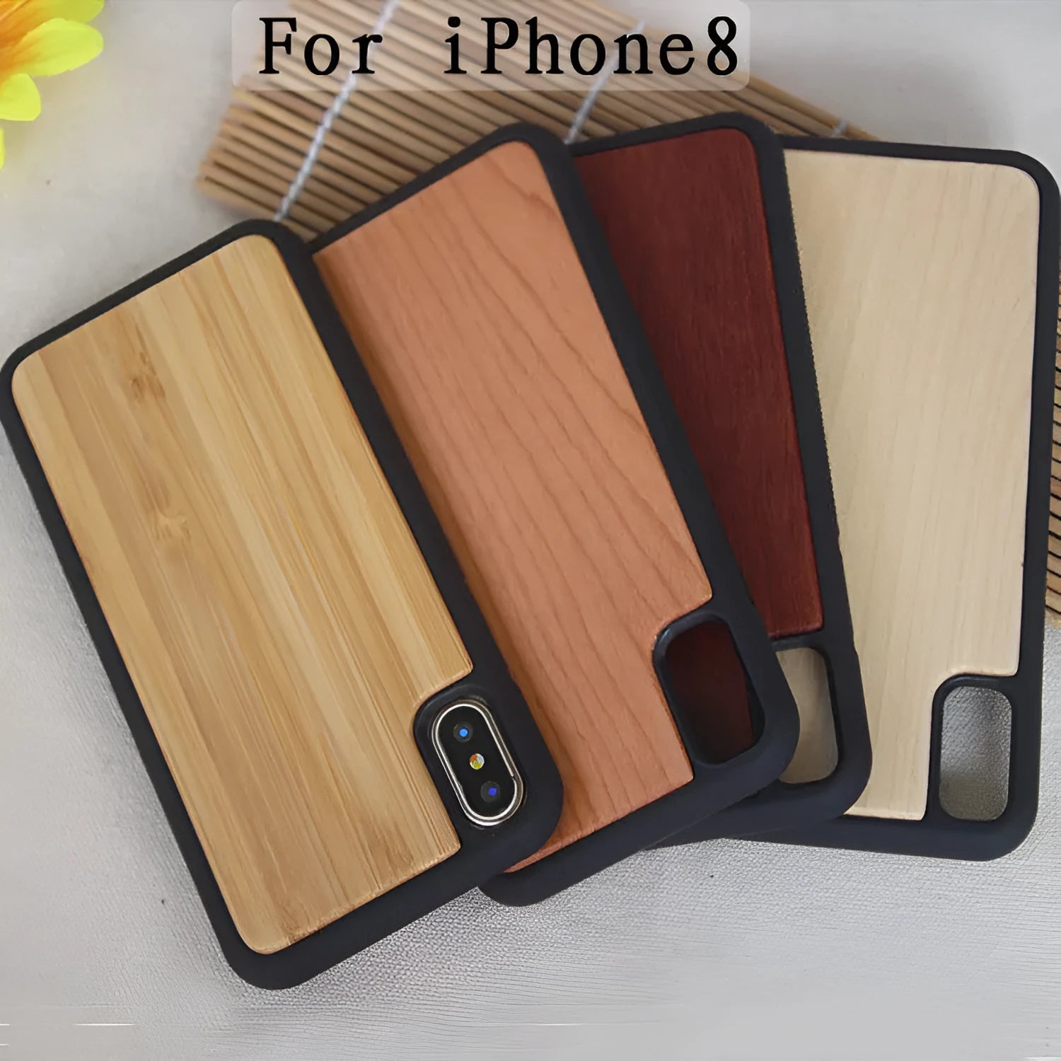 TPU iPhone case with a carbonised bamboo wooden back panel shown in different wood finish colours.