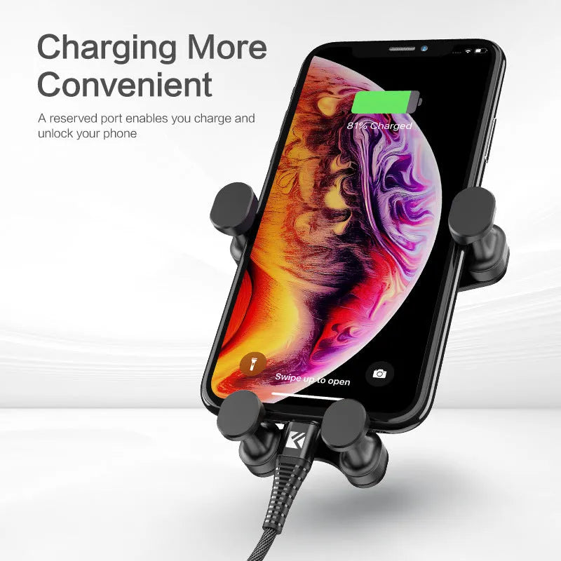 Black car phone holder with 360-degree rotating head on a car dashboard