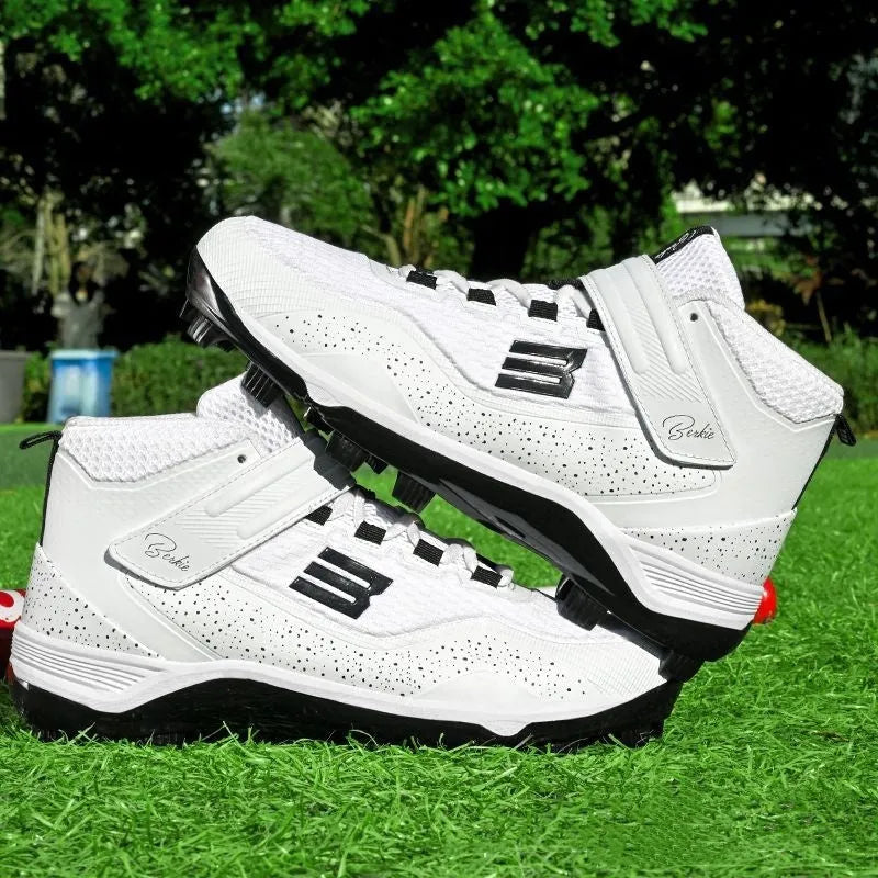 Black and white youth baseball training sneakers with a Velcro strap and textured rubber sole.
