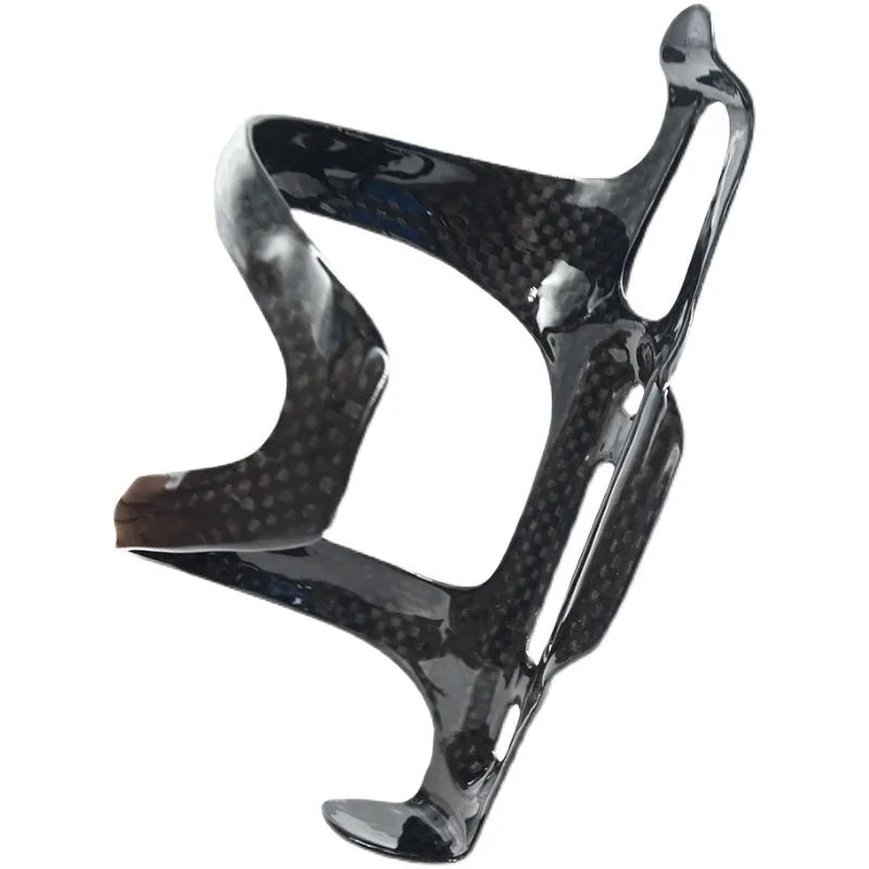 Black carbon fibre side-pull water bottle cage for bicycles, showing mounting holes and side-access design.