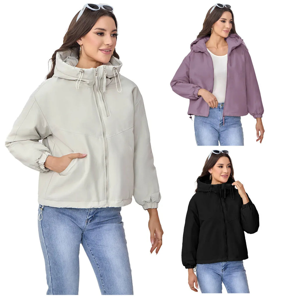 A woman's loose-fit hooded jacket in solid-colour polyester, shown in grey.