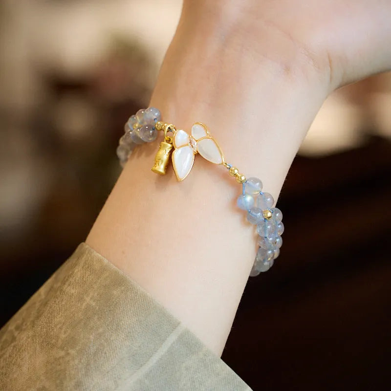 Grey moonstone butterfly charm woven bracelet for women with geometric retro styling