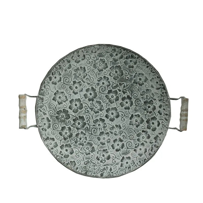 Round European style wrought iron storage tray in two sizes for home organisation.