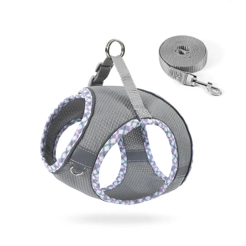 Step-in no-pull dog harness with breathable mesh, quick-release buckle, reflective strips, and attached 1.2m leash.