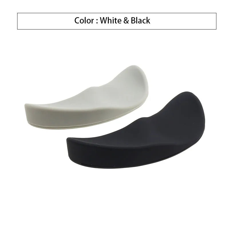Ergonomic silicone gliding mouse wrist rest for right-handed use, black, 10 x 4.5 x 5 cm, on desk with computer mouse