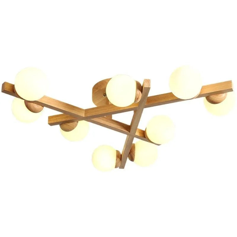 Modern Nordic-style ceiling light with wooden accents and three white lamp heads mounted on a clean, white ceiling.