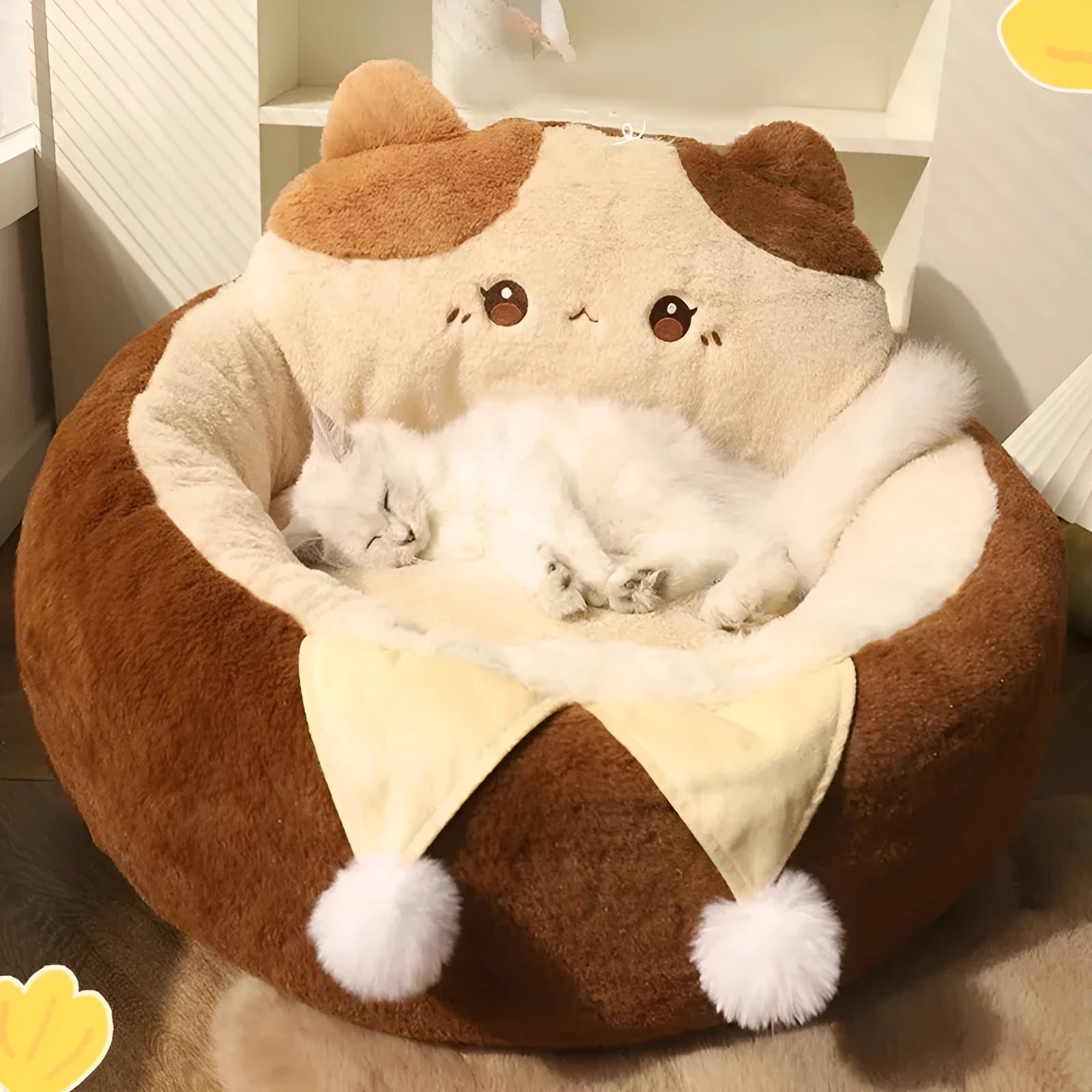 A round grey pet bed for cats and dogs on a wooden floor.