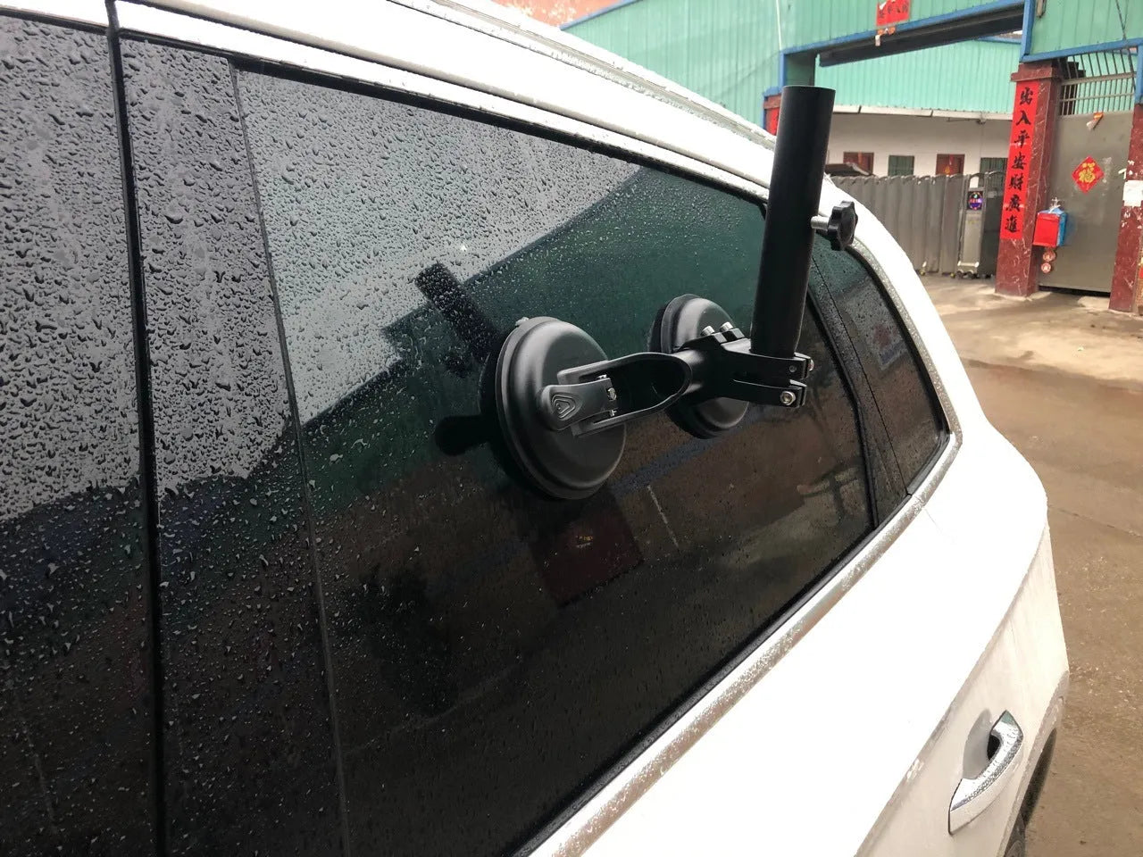 Black ABS car flagpole sucker mount with round glass suction cup for off-road vehicles.