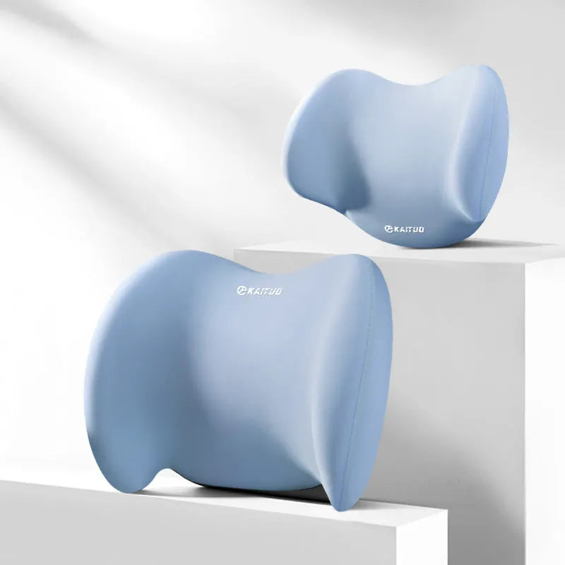 Grey geometric-patterned memory foam car headrest pillow and lumbar support pillow on a car seat.