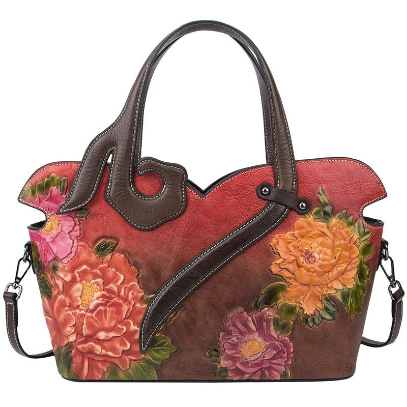 Women's genuine cowhide leather tote bag with floral embossing and zipper closure, horizontal square shape