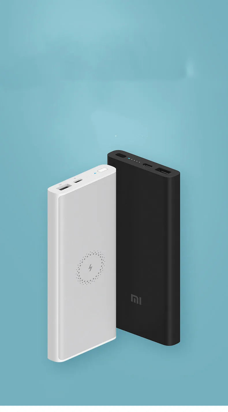 Black and white 10000mAh power bank with wireless charging and USB Type C port.