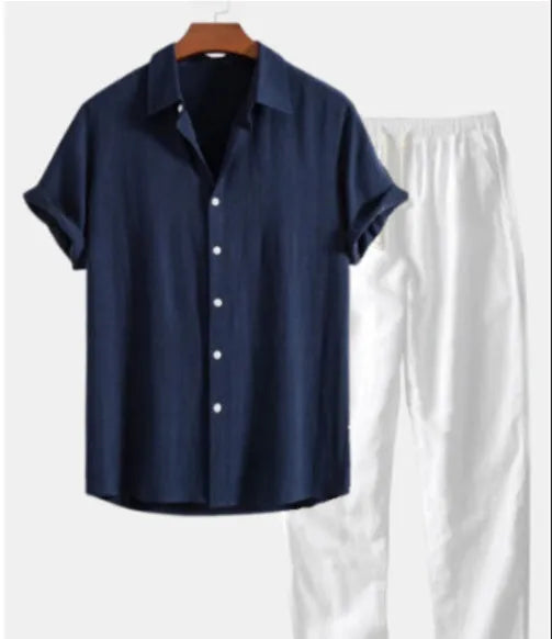 Men's green floral printed slim fit shirt and trousers set on a hanger.