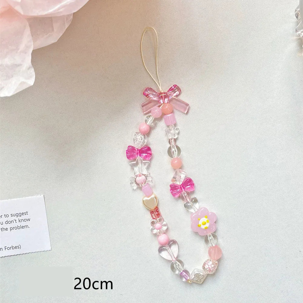 Colourful beaded floral phone lanyard in blue, pink, or yellow on a rope cord.