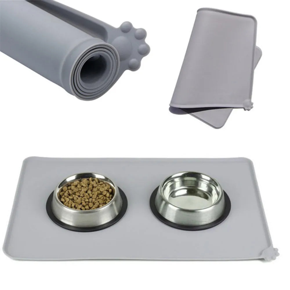 Waterproof silicone pet feeding mat in grey with non-slip base and raised edges, size 47x29.5cm