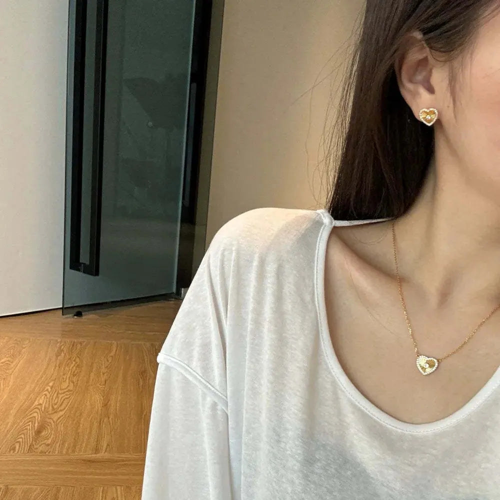 Gold colour 925 sterling silver necklace with retro heart and totem pendant on a clavicle chain
