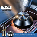 Black metal butterfly-style car aromatherapy machine with USB cable and bottle of essential oil