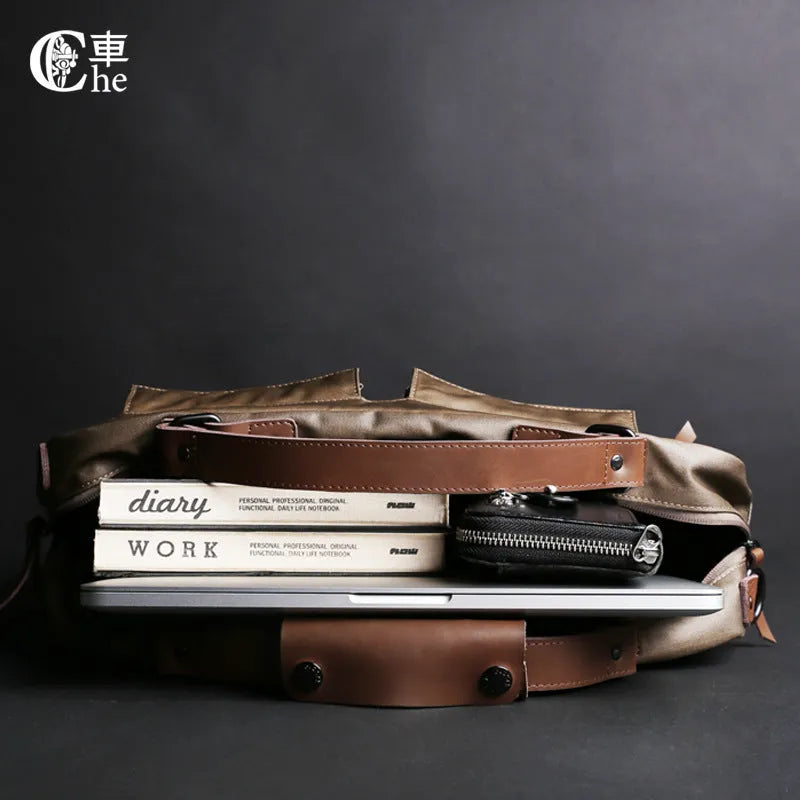 Dpark black laptop shoulder bag for 14-inch and 15-inch laptops on a table