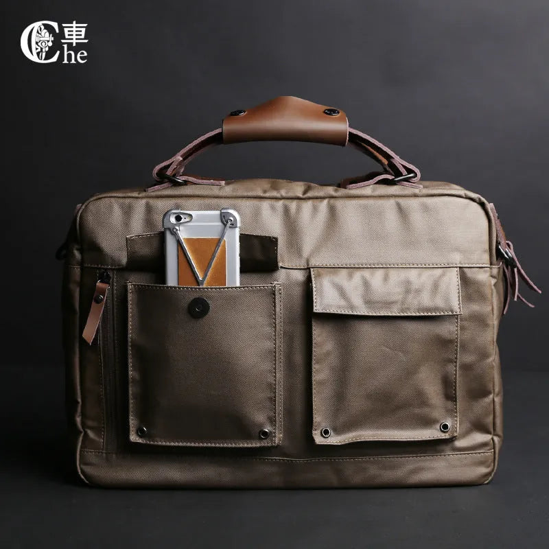 Dpark black laptop shoulder bag for 14-inch and 15-inch laptops on a table