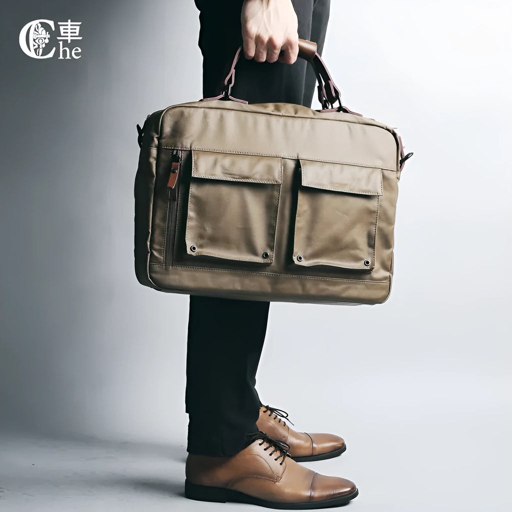 Dpark black laptop shoulder bag for 14-inch and 15-inch laptops on a table