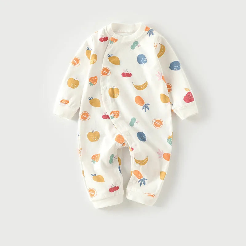 Cotton baby pajamas in cartoon dragon print for a newborn infant.