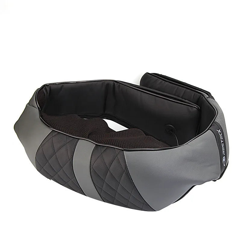 Grey electric massage shawl draped over shoulders with control unit and power cord visible