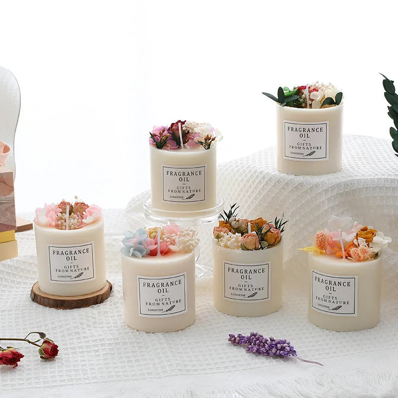 Dried flowers decor romantic aromatherapy candle in a jar with embedded botanicals.
